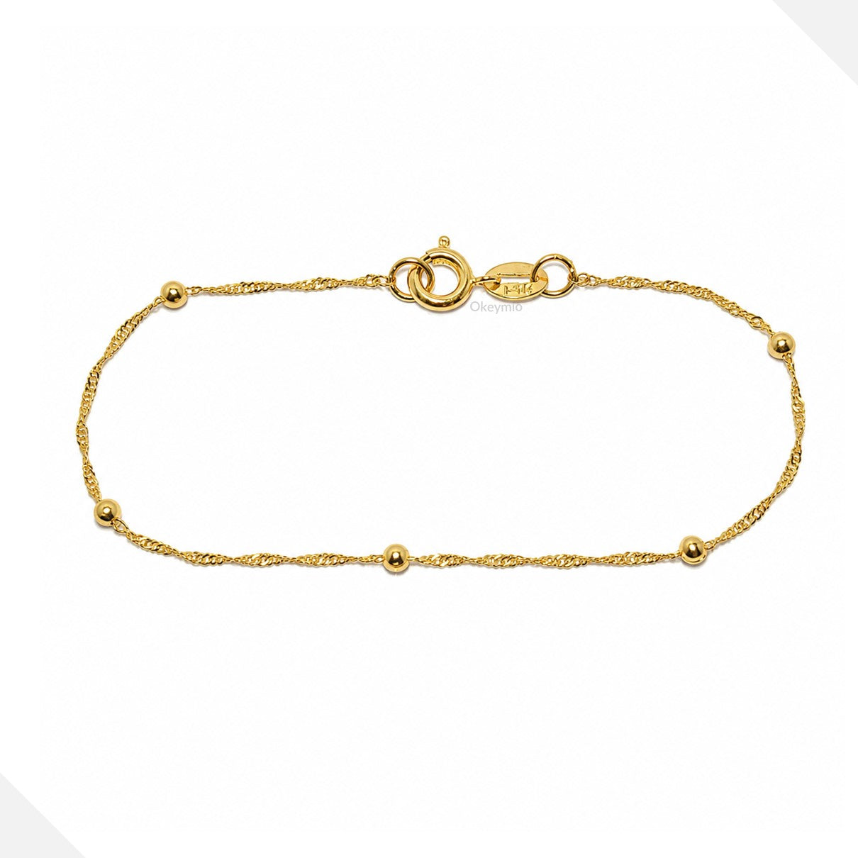 Pulsera Singapur Con balines En Oro Laminado 18k