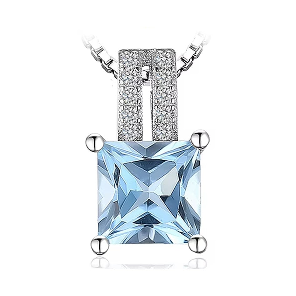 Dije y Cadena Con Topacio Azul En plata 925